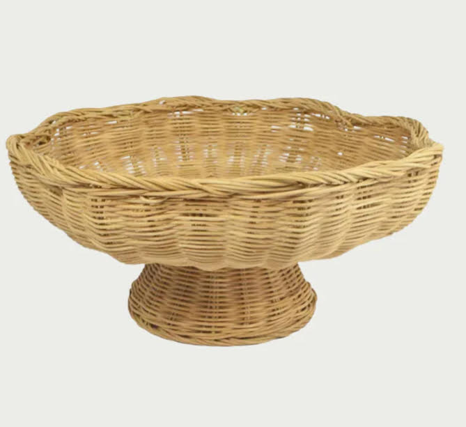 Wicker fruit bowl on a white background